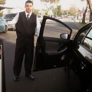 A&A valet attendant with guest vehicle at a Woodland Hills event