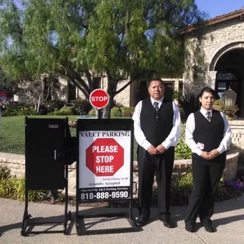 A&A Parking uniformed valet attendants at Calabasas estate mansion entrance