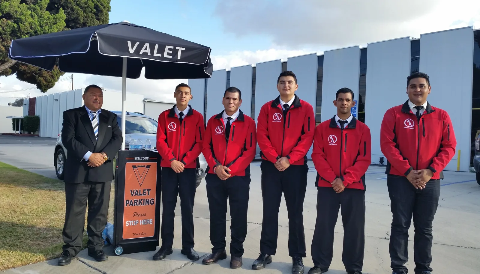 A&A Parking owner and full six-person uniformed valet team at a Calabasas valet stand
