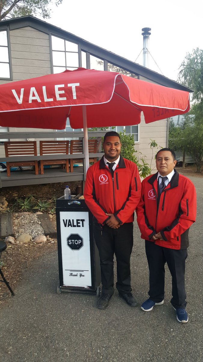 A&A staff member in uniform at valet post