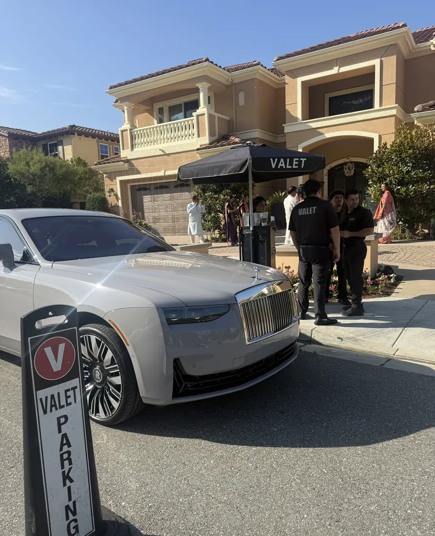 A&A Parking Services valet attendants with a Rolls-Royce Ghost at a wedding at a Yorba Linda mansion